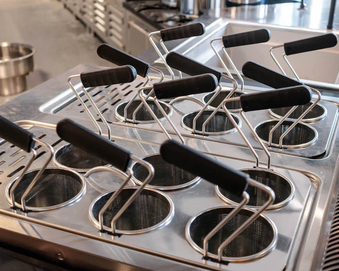Heater baskets with black handles. 