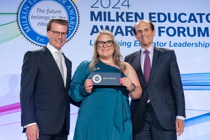 Pictured is 2023 West Virginia Milken Educator Janna Hamrick posing for a photo with Lowell Milken, Milken Educator Awards founder and Milken Family Foundation chairman and co-founder, and Mike Milken, president and co-founder of the Milken Family Foundation.