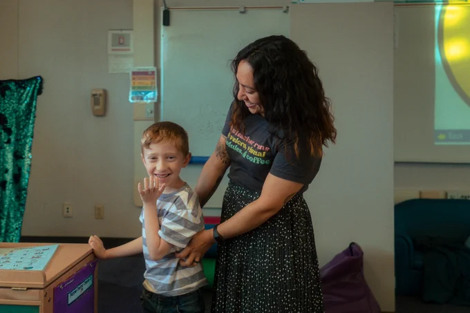 Special education teacher Paulina Norris, a 2022 alumna of SDSU, worked with a student last year at W.D. Hall Elementary School in El Cajon.