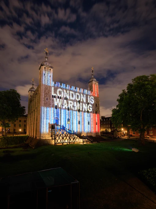 The White Tower at the Tower of London in the dark, lit up with stripes. On the left the stripes are blue, on the right they are red. Text reads over the middle Start a Conversation #Showyourstripes