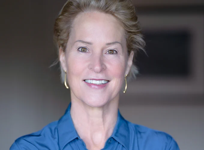 A woman in a blue shirt