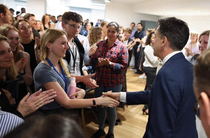 Ed Miliband, Secretary of State for Energy Security and Net Zero, greeting staff at the Department of Energy Security and Net Zero.