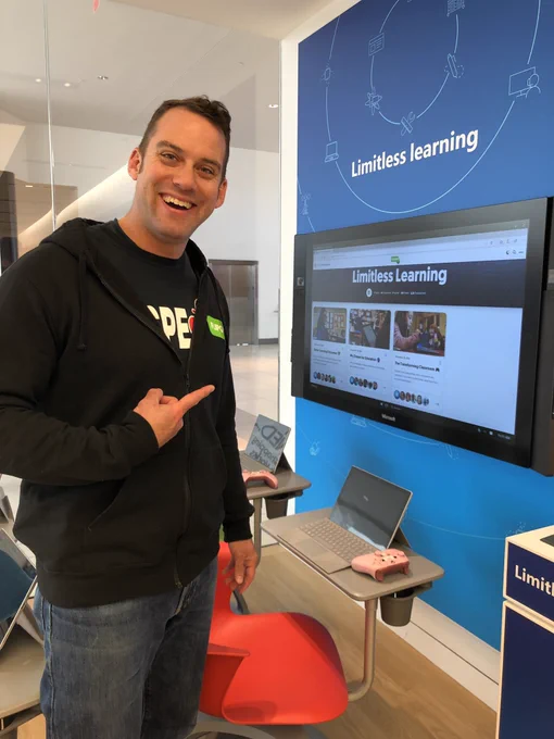 Andy pointing to Limitless Learning with Flipgrid jacket in a Microsoft Store