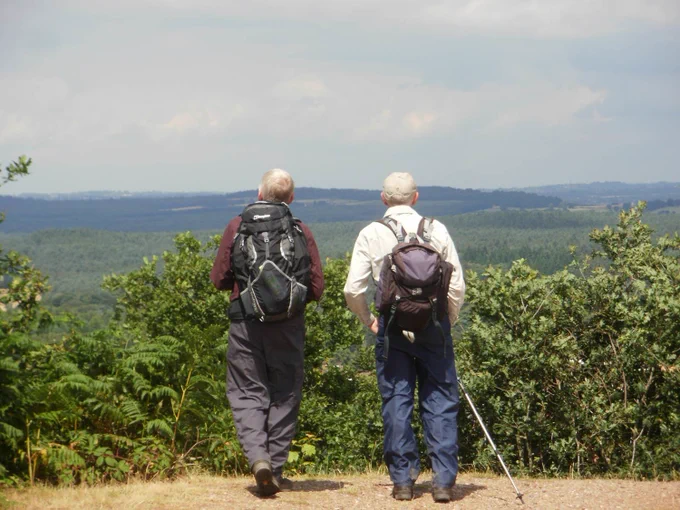 Two walkers enjoying a view