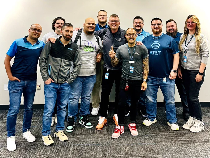 Team members pose for a photo