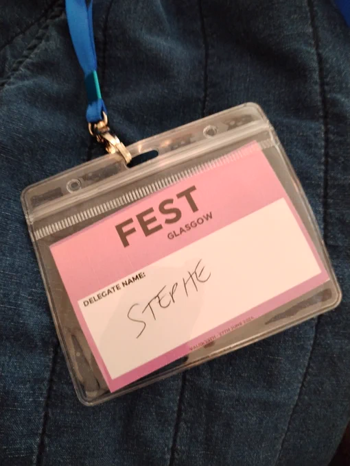 A conference lanyard, with the heading FEST GLASGOW. The name Stephe is handwritten on it. 