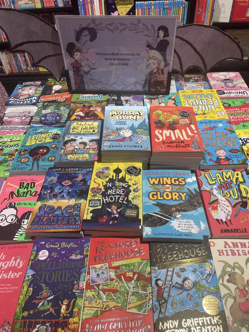 A 5-8 table in Waterstones Brighton with a pile of Small books next to The Boy Who Grew Dragons