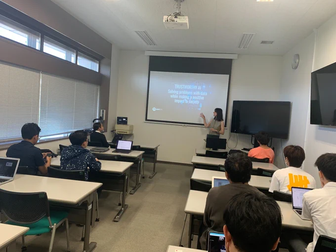Anna Valli delivering a talk on Trustworthy AI at KyuTech