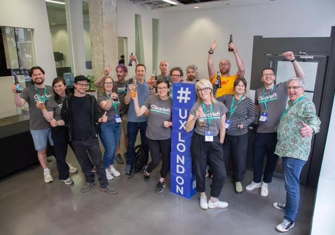 The Clearleft team gathered together in the venue at the end of UX London, all smiling and raising a toast to a job well done.