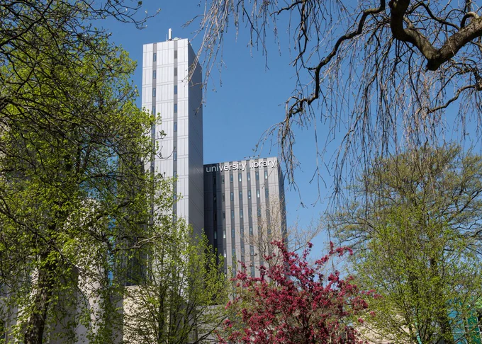 The University Library building against a blue sky