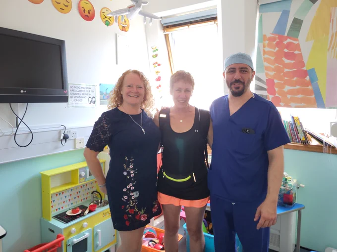 Alex Eades with Gail Scott-Spicer, Chief Executive of King's College Hospital Charity and Bassel Zebian, Surgeon of Charlotte Eades