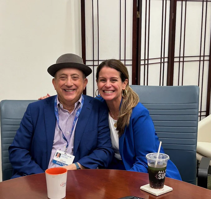 Dr. Licht and the CEO of Live Like Bella pose for a photo.