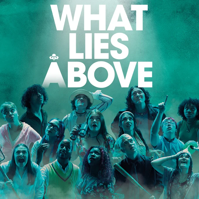What Lies Above in white text above a group of young performers looking to the sky with props 