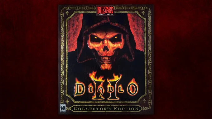 The cover of the Diablo II Collector’s Edition PC box against a textured, red background. On the cover, an orange skull peers out from underneath a black hood, its face a terrifying grin. From the deep pits of its eye sockets are spots of orange, glowing like coals. Underneath is the Diablo II logo, wreathed in flame. A gilded frame surrounds the skull, with the words “Collector’s Edition" overlaid in stylized text. A rated M for Mature logo is on the bottom left, and a red Blizzard Entertainment logo is at the top.