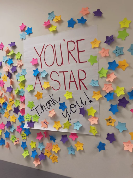 A “Star Wall”, showing notes of appreciation by staff and faculty members on star-shaped sticky notes.