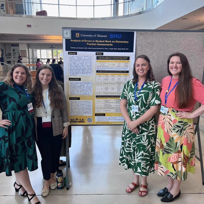 Graduate students from Mizzou and SMU standing around a black and gold academic poster at the MCLS conference in Washington DC, describing the fraction errors that 4th grade students in Project SCALE year 1 made most often.