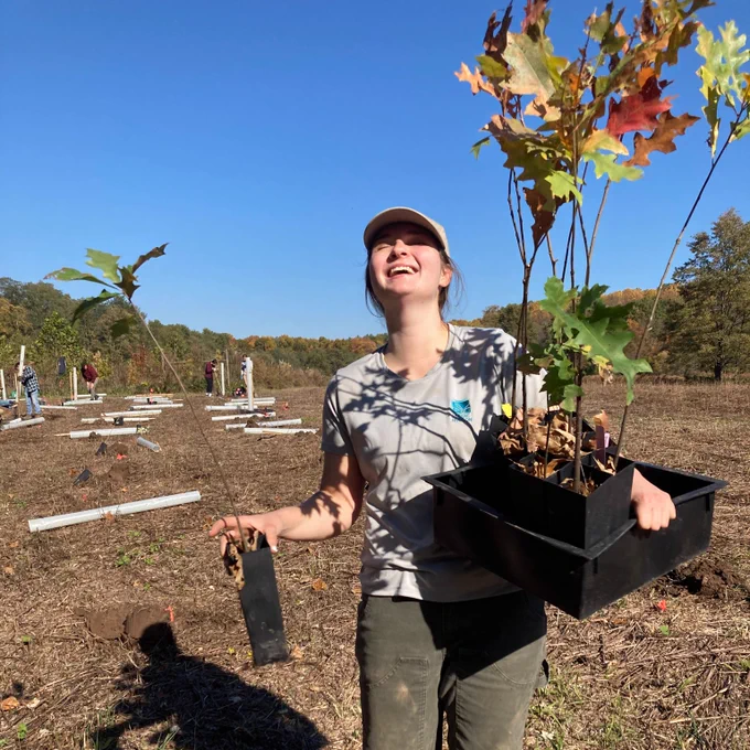 Volunteer with the "Trees for Tribs" program  / Photo by Claire Wegh