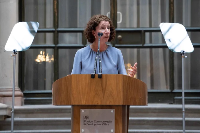 Anneliese Dodds addresses the Foreign, Commonwealth and Development Office from a lectern, with autocues on either side.