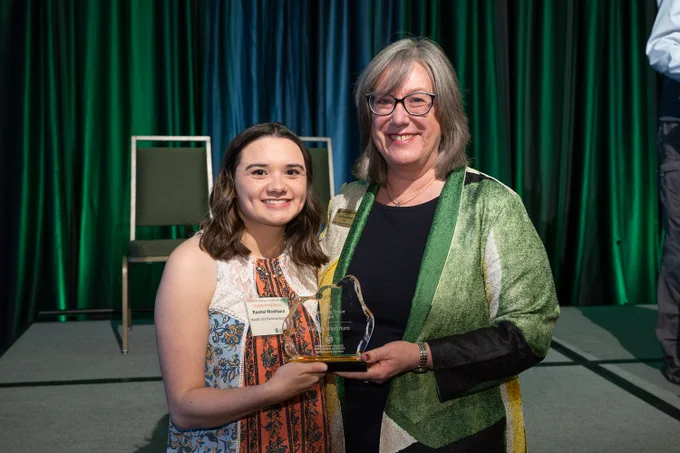 Rachel Washburn smiles with Dean Lise Youngblade.