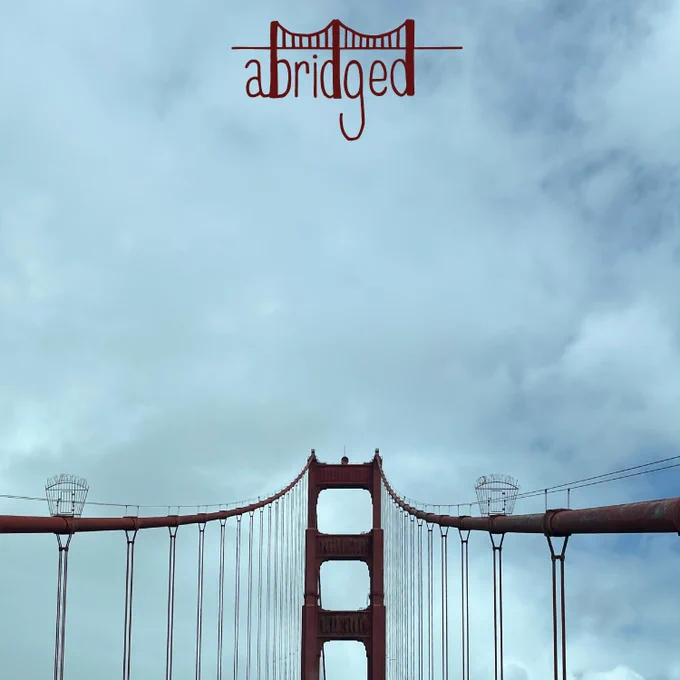 A tower of the Golden Gate Bridge with cables swooping down on either side, centered against the backdrop of a brooding cloudy sky. The Abridged logo is at the top of the image.