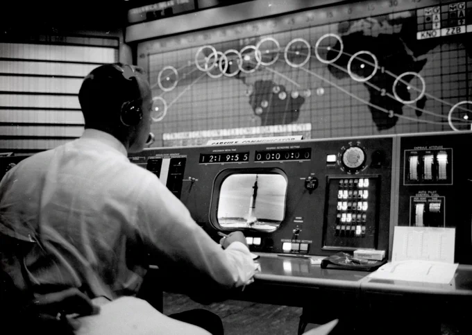 Fellow Mercury astronaut Alan Shepard watches launch at the CAPCOM console in Mercury Control during Gus Grissom's July 21, 1961, Mercury-Redstone 4 (Liberty Bell 7) flight. Credit: NASA