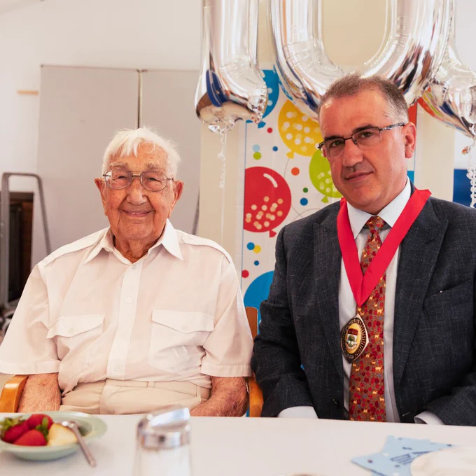 Charlie Hatfield and Councillor Anthony Kelly at Charlie's 100th birthday, Age UK Ealing's Wellbeing Day Centre