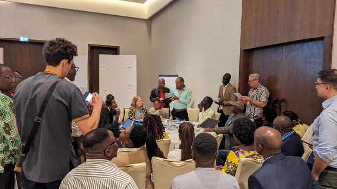 Participants at CBA18 in Tanzania in discussion during a session.