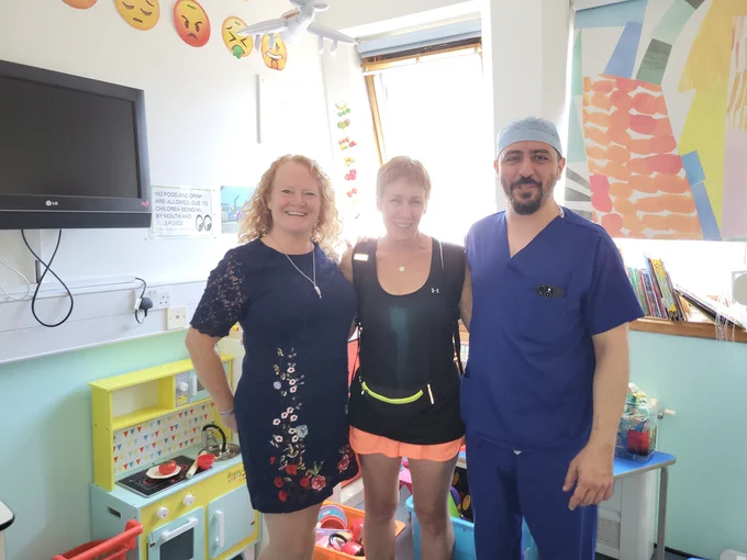 Image of Gail Scott-Spicer, CEO King's College Hospital Charity, Alex and Bassel Zebian, Consultant Paediatric and Adult Neurosurgeon at King's. Alex and her colleagues completed a 64-mile overnight walk from King's College Hospital Charity to Hove in memory of her daughter, Charlotte Eades.