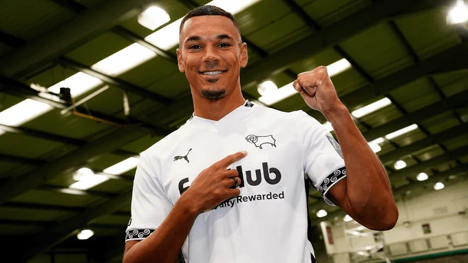 Kayden Jackson points to the Ram on his chest after signing!