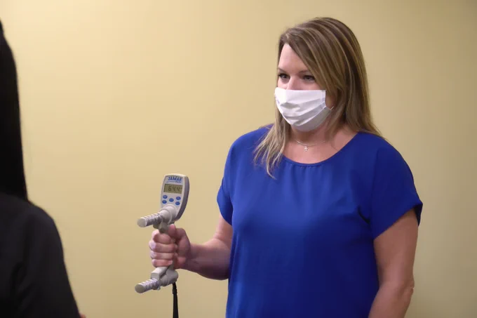 Project Baseline Health Study participant performs the hand grip strength assessment during a study visit at Duke CTSI's research site in Kannapolis. 
