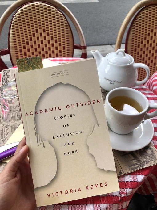 This is a photo of the Book “Academic outsider. Stories of exclusion and hope” by Dr. Victoria Reyes.