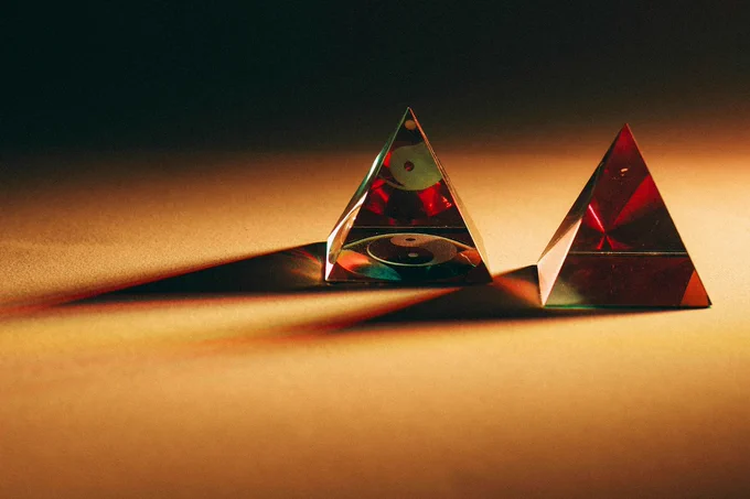 Two prisms, refracting faint light