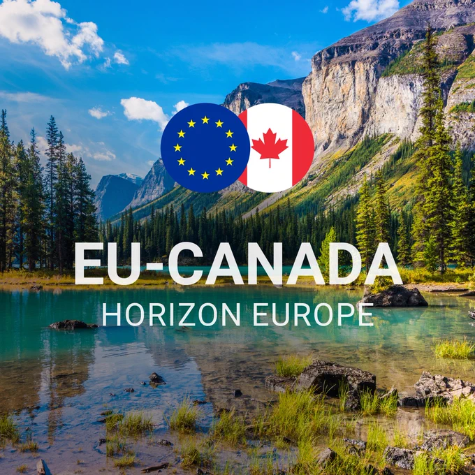 A scenic Canadian landscape featuring a clear blue lake surrounded by pine trees and rocky mountains under a bright blue sky with scattered clouds. Overlaid on the image are the European Union flag and the Canadian flag, with the text 'EU-CANADA Horizon Europe' below the flags. 
