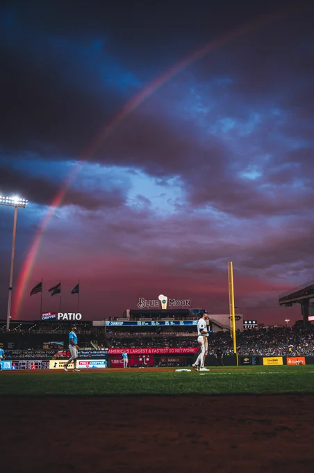 A photo of Kauffman Stadium as a rainbow arches across the sky behind it. (Photo by Amy Kontras/Kansas City Royals)