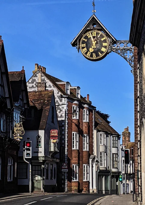 Lewes Town Clock over the High Street, showing a few minutes before 7am