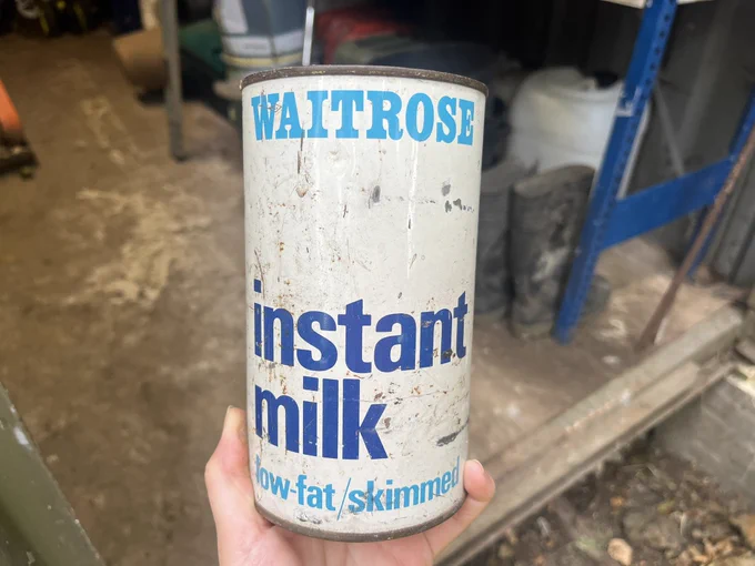 An old white tin which says in blue letters that it contained low-fat/skimmed instant milk from Waitrose. It doesn’t anymore!