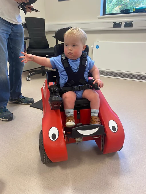Morris looking super cool in his brand new Wizzybug powered wheelchair at his handover assessment