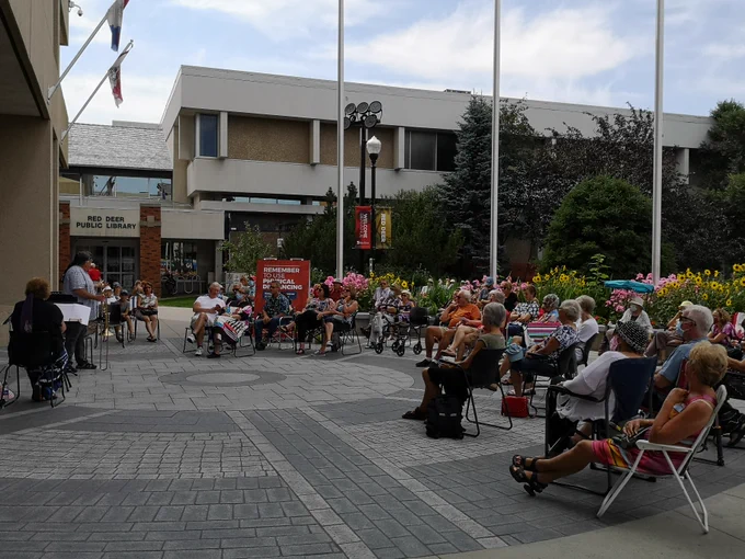 Crowd enjoying a concert outdoors at City Hall Park a few years ago.