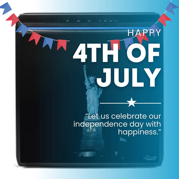 Rabbit Air purifier with a backdrop of the Statue of Liberty. Text overlay reads: 'Happy 4th of July - Let us celebrate our independence day with happiness.