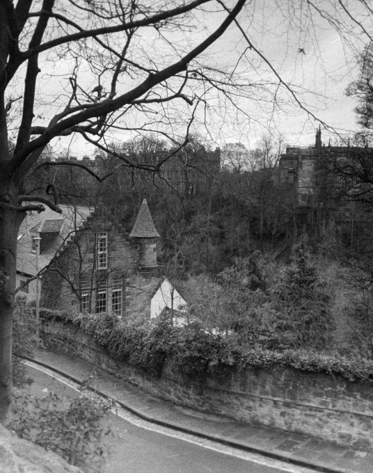 Half frame black and white photograph of the edge of the Dean Village in Edinburgh