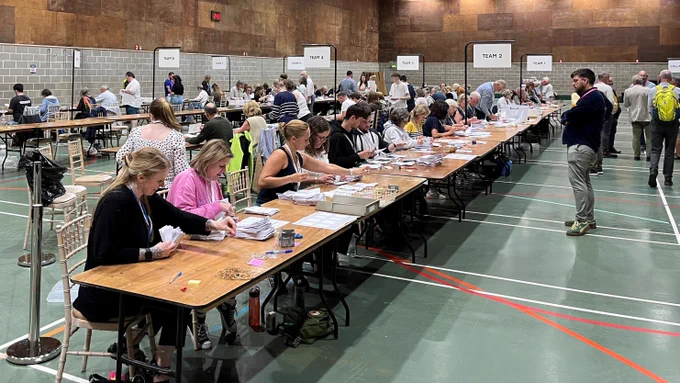 Redlands Sports Hall - People at desks counting votes