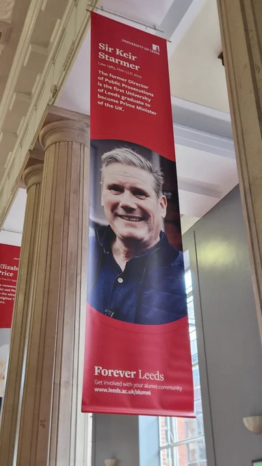 Hanging banner of keir starmer that has been updated to say first leeds uni graduate to become prime minister 