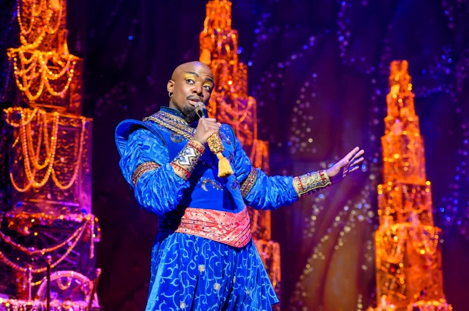 Yeukayi Ushe (as Genie) in a scene from the UK and Ireland touring production of Disney’s Aladdin