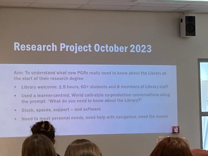 A power point slide from the ALn conference. The text reads ‘research projects October 2023’ Aim: To understand what new PGRs really need to know about the Library at the start of their research degree
• Library welcome: 1.5 hours, 60  students and 8 members of Library staff
• Used a learner-centred, World café-style co-production conversations using the prompt: "What do you need to know about the Library?"
• Stock, spaces, support - and software
• Need to meet personal needs, need help with navigation, need the basics