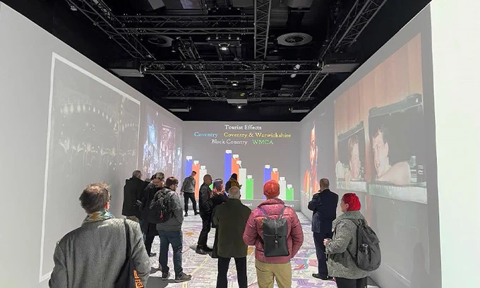 Creative digital wall display with spectators 