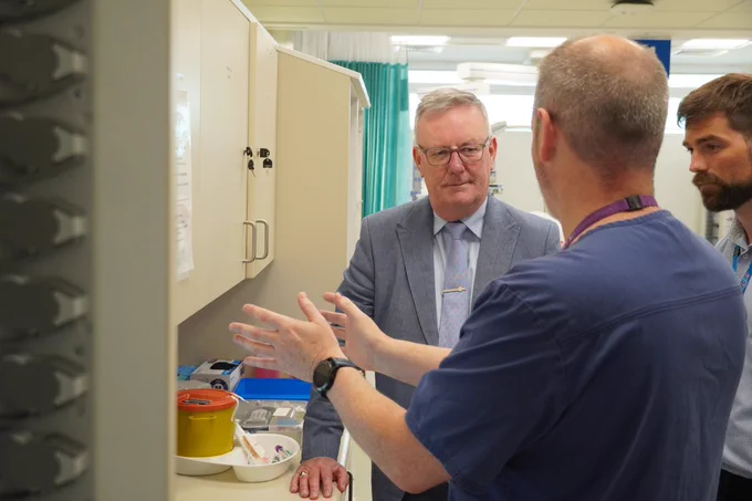 Health Minister Mike Nesbitt speaks to ED Consultant Dr Andrew Dobbin in the emergency department at Ulster Hospital.