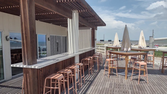 Beautiful and Weathered Ipe Pavers Over Buzon Pedestals atop the Rooftop Terrace at Hotel Lucine in Galveston Texas