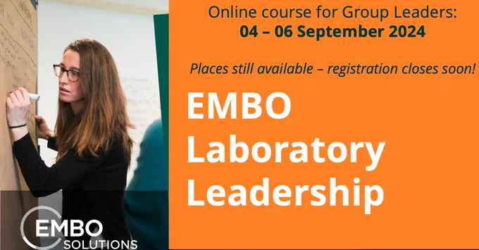 A woman writing on a flip chart in a lab leadership course. Text highlights there are still places available in the next online group leader course 04 – 06 September 2024