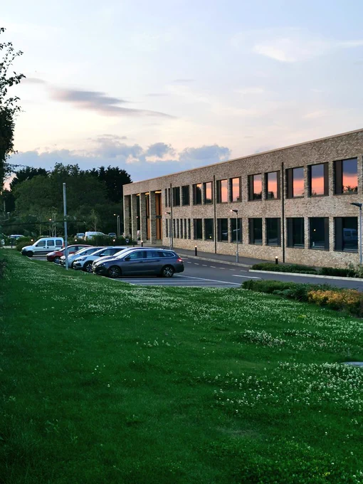Leckhampton High School with sunset in windows