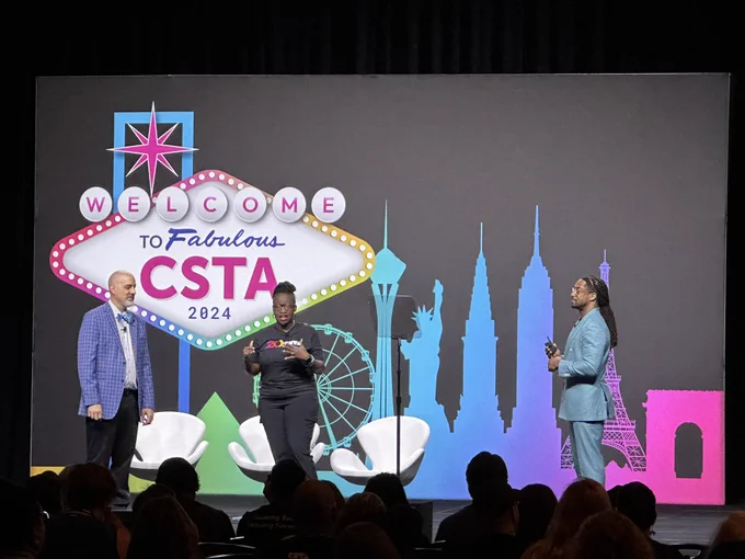 Charity and Dan on stage at CSTA 2024